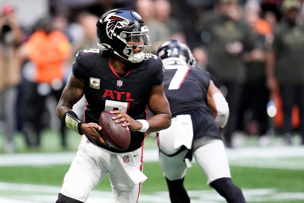 Nov 16, 2025; Atlanta, Georgia, USA; Atlanta Falcons quarterback Michael Penix Jr. (9) looks for an open receiver in the second half against the Carolina Panthers at Mercedes-Benz Stadium. Mandatory Credit: Dale Zanine-Imagn Images