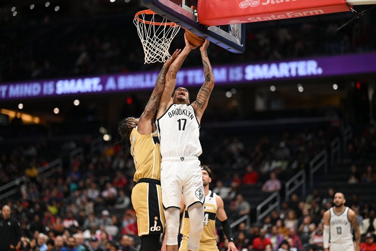 Nov 16, 2025; Washington, District of Columbia, USA;  Brooklyn Nets forward Michael Porter Jr. (17) is fouled by Washington Wizards forward Cam Whitmore (1) during the second quarter at Capital One Arena. Mandatory Credit: Rafael Suanes-Imagn Images