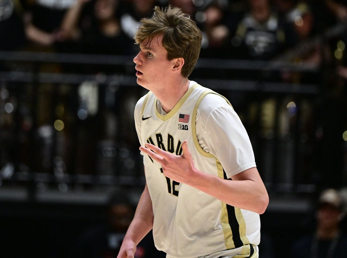 Nov 16, 2025; West Lafayette, Indiana, USA; Purdue Boilermakers center Daniel Jacobsen (12) celebrates a three point shot during the first half against the Akron Zips at Mackey Arena. Mandatory Credit: Marc Lebryk-Imagn Images