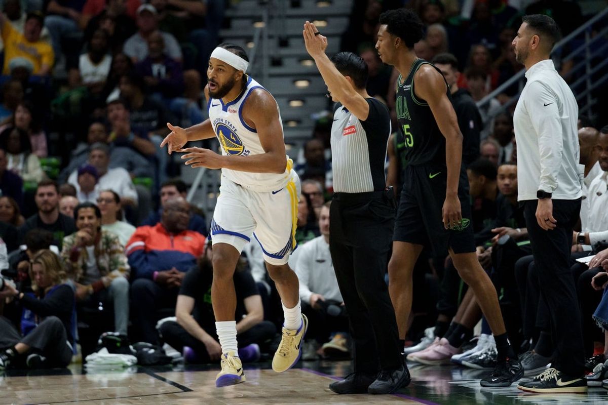 Nov 16, 2025; New Orleans, Louisiana, USA; Golden State Warriors guard Moses Moody (4) celebrates a three point basket against New Orleans Pelicans forward Trey Murphy III (25) during the first half at Smoothie King Center. Mandatory Credit: Matthew Hinton-Imagn Images