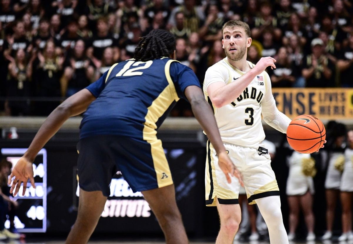 Nov 16, 2025; West Lafayette, Indiana, USA; Purdue Boilermakers guard Braden Smith (3) looks to get past Akron Zips guard Evan Mahaffey (12) during the second half at Mackey Arena. Mandatory Credit: Marc Lebryk-Imagn Images