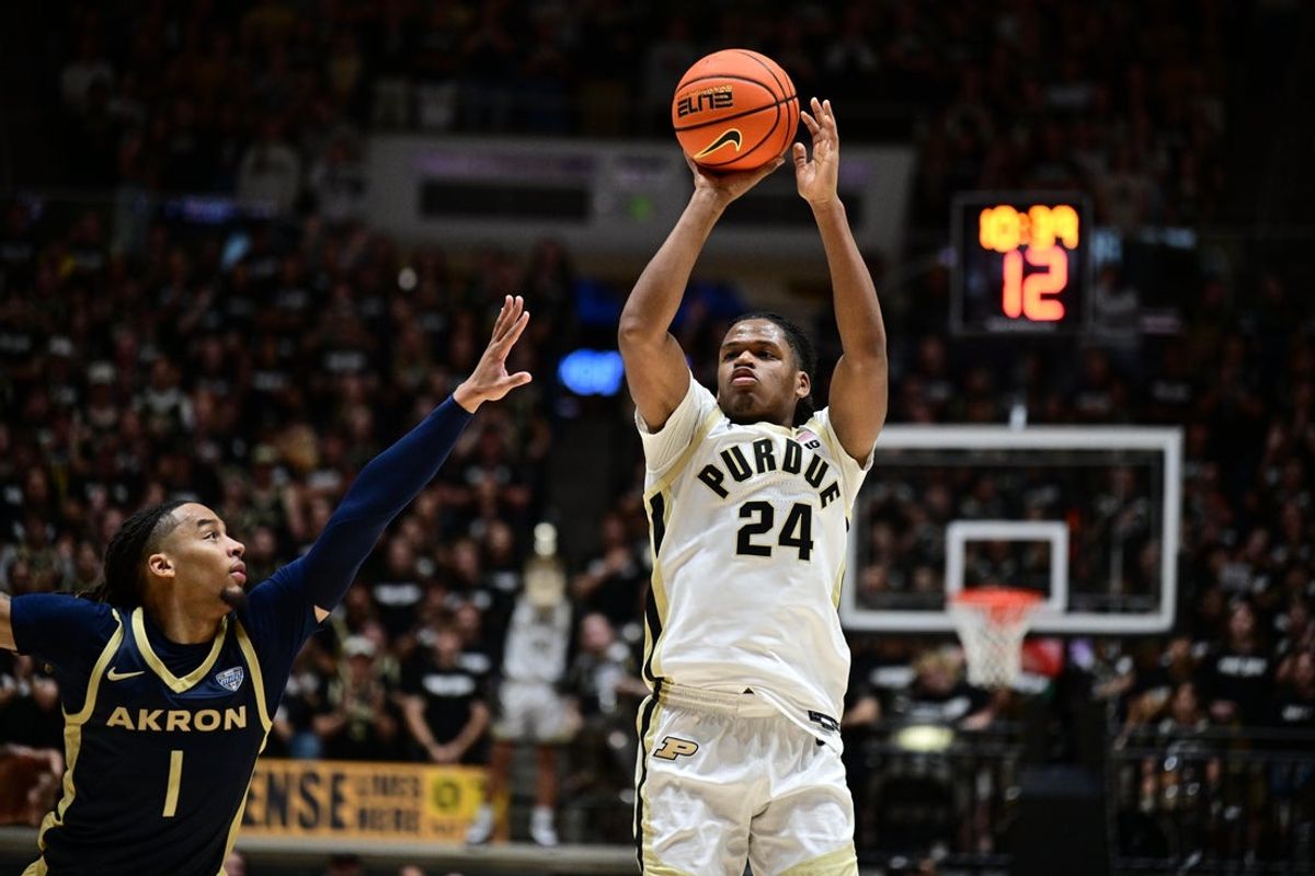 Nov 16, 2025; West Lafayette, Indiana, USA; Purdue Boilermakers guard Gicarri Harris (24) shoots the ball over Akron Zips guard Shammah Scott (1) during the second half at Mackey Arena. Mandatory Credit: Marc Lebryk-Imagn Images
