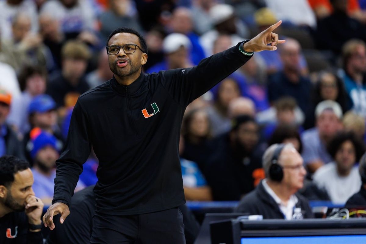 Nov 16, 2025; Jacksonville, Florida, USA; Miami Hurricanes head coach Jai Lucas gestures against the Florida Gators during the second half at VyStar Veterans Memorial Arena. Mandatory Credit: Matt Pendleton-Imagn Images