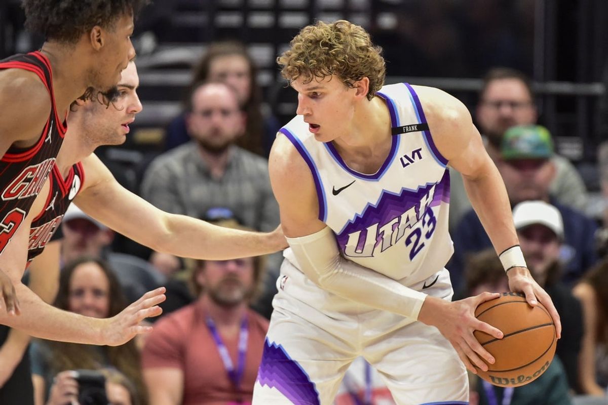 Nov 16, 2025; Salt Lake City, Utah, USA; Utah Jazz forward/center Lauri Markkanen (23) prepares his shot against Chicago Bulls guard Josh Giddey (3) during double overtime at Delta Center. Mandatory Credit: Peter Creveling-Imagn Images