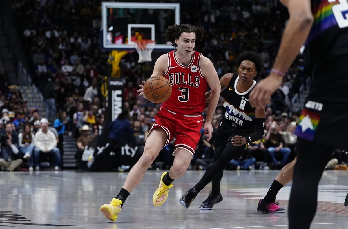 Nov 17, 2025; Denver, Colorado, USA; Chicago Bulls guard Josh Giddey (3) controls the ball in the first quarter against the Denver Nuggets at Ball Arena. Mandatory Credit: Ron Chenoy-Imagn Images
