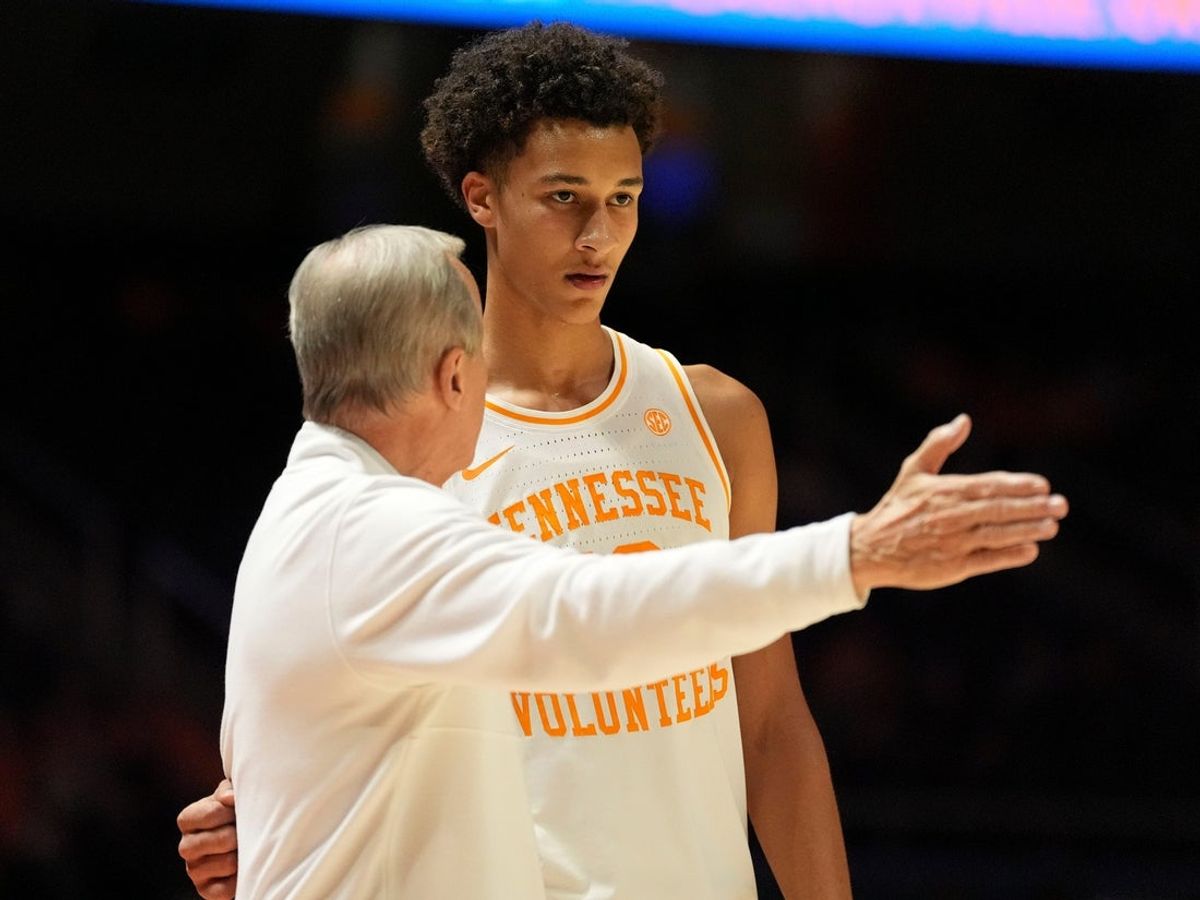 Tennessee basketball coach Rick Barnes talks with Tennessee forward Nate Ament (10) during an NCAA college basketball game against Rice on November 17, 2025, in Knoxville, Tenn.