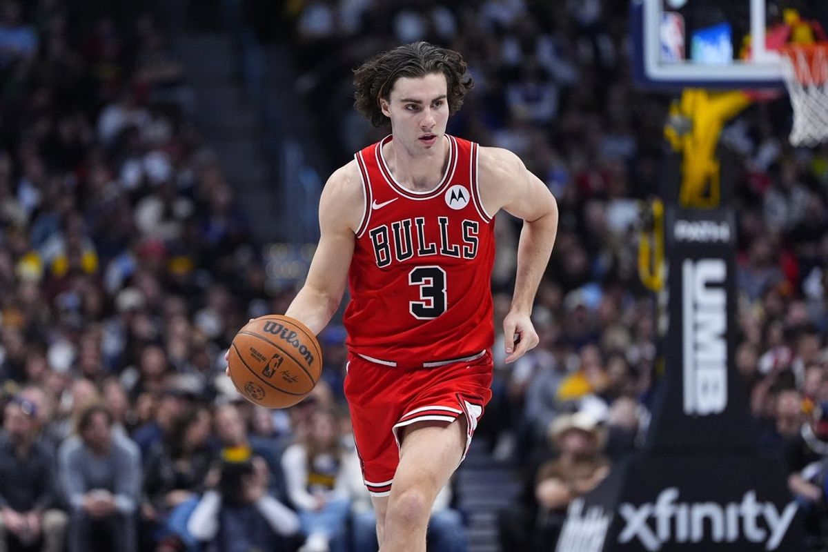 Nov 17, 2025; Denver, Colorado, USA; Chicago Bulls guard Josh Giddey (3) controls the ball in the second quarter against the Denver Nuggets at Ball Arena. Mandatory Credit: Ron Chenoy-Imagn Images