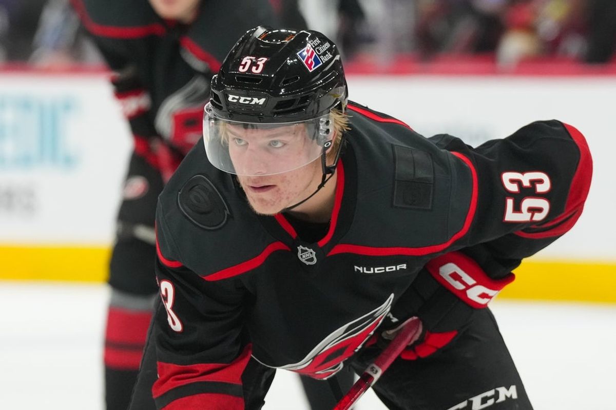 Nov 11, 2025; Raleigh, North Carolina, USA;  Carolina Hurricanes right wing Jackson Blake (53) gets ready for the face-off against the Washington Capitals during the third period at Lenovo Center. Mandatory Credit: James Guillory-Imagn Images
