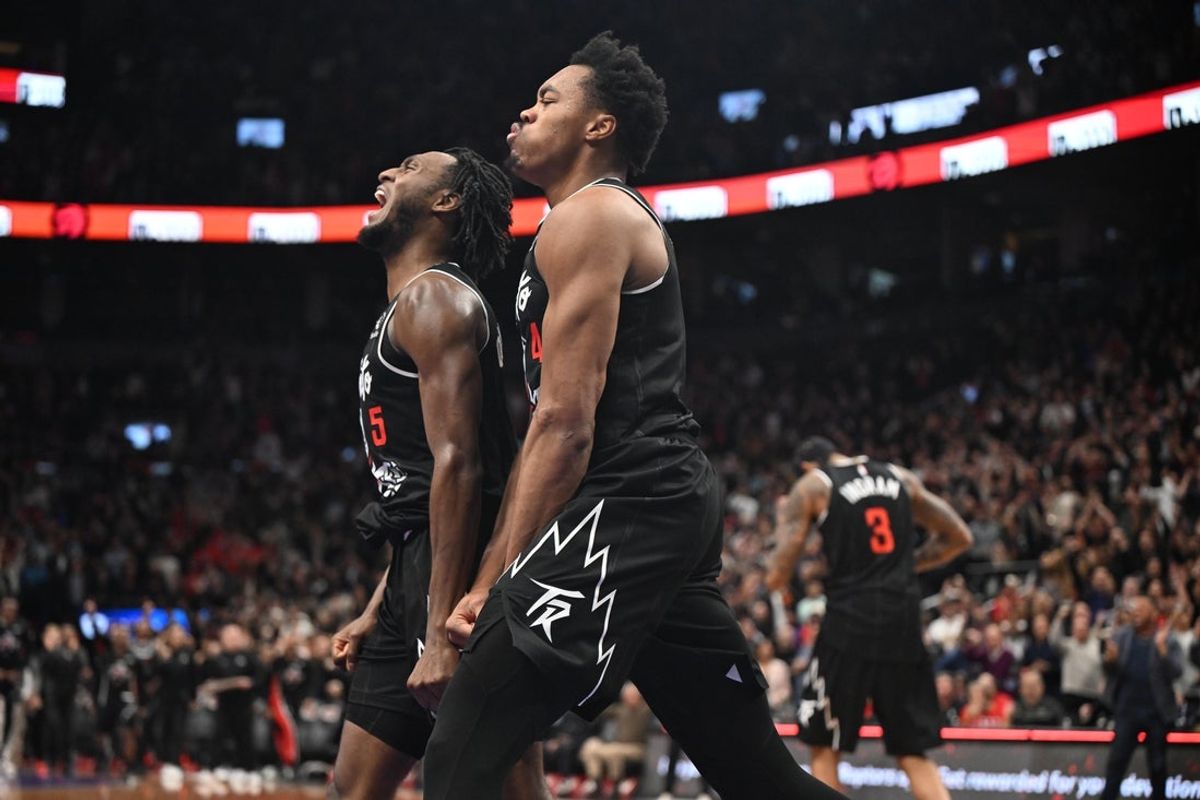 Nov 17, 2025; Toronto, Ontario, CAN;  Toronto Raptors forward Scottie Barnes (4) and guard Immanuel Quickley (5) celebrate after a win over the Charlotte Hornets at Scotiabank Arena. Mandatory Credit: Dan Hamilton-Imagn Images