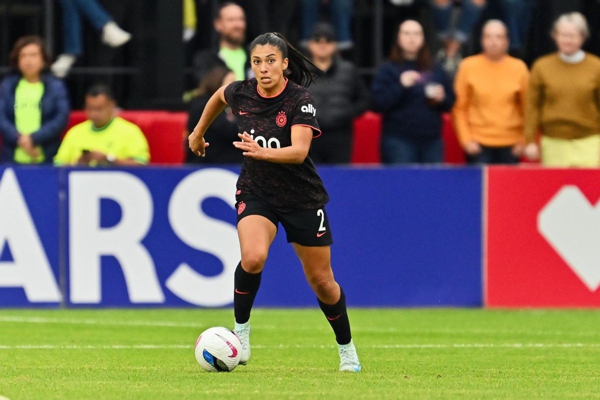 Nov 15, 2025; Washington, District of Columbia, USA;  Portland Thorns defender Reyna Reyes (2) controls the ball against the Washington Spirit at Audi Field. Mandatory Credit: Jamie Sabau-Imagn Images