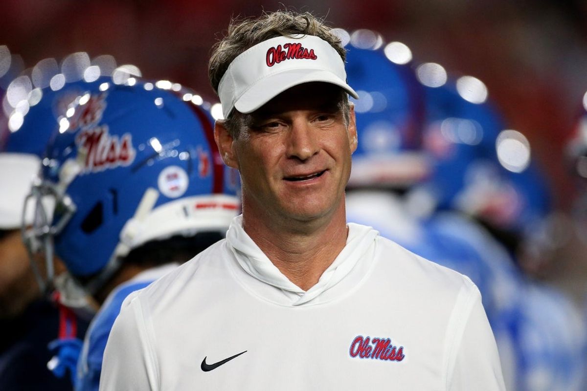 Nov 15, 2025; Oxford, Mississippi, USA; Mississippi Rebels head coach Lane Kiffin looks on during warm ups prior to the game  against the Florida Gators at Vaught-Hemingway Stadium. Mandatory Credit: Petre Thomas-Imagn Images