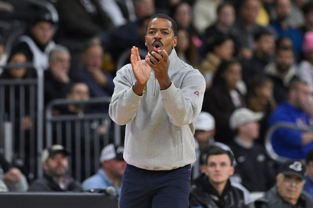 Nov 18, 2025; Providence, Rhode Island, USA; Providence Friars head coach Kim English reacts to game action during the first half against the New Hampshire Wildcats at Amica Mutual Pavilion. Mandatory Credit: Eric Canha-Imagn Images