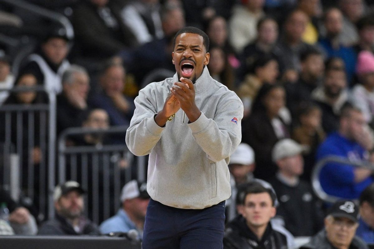 Nov 18, 2025; Providence, Rhode Island, USA; Providence Friars head coach Kim English reacts to game action during the first half against the New Hampshire Wildcats at Amica Mutual Pavilion. Mandatory Credit: Eric Canha-Imagn Images