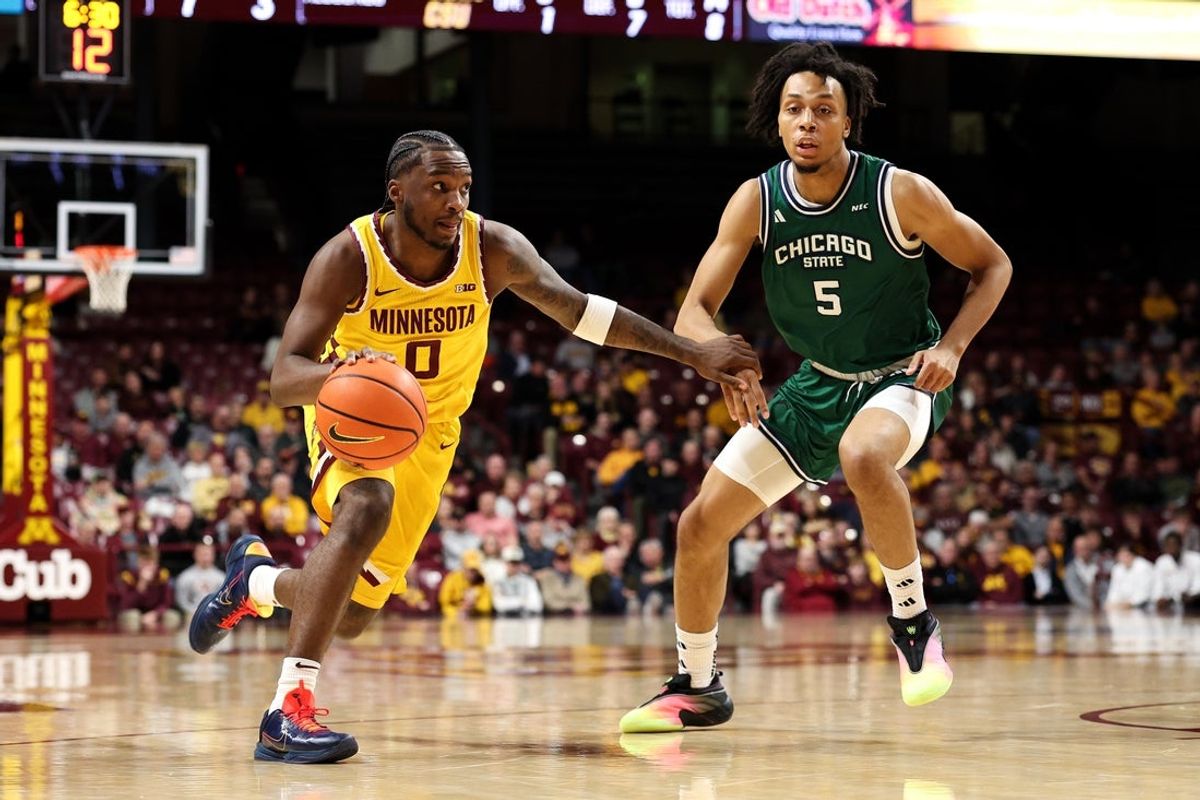 Nov 18, 2025; Minneapolis, Minnesota, USA; Minnesota Golden Gophers guard Chansey Willis Jr. (0) works around Chicago State Cougars guard Chauncey Gibson (5) during the first half at Williams Arena. Mandatory Credit: Matt Krohn-Imagn Images