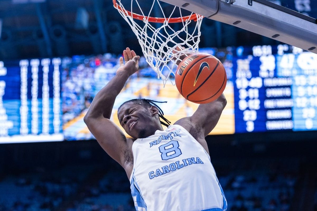 Nov 18, 2025; Chapel Hill, North Carolina, USA; North Carolina Tar Heels forward Caleb Wilson (8) dunks against the Navy Midshipmen during the second half at Dean E. Smith Center. Mandatory Credit: Scott Kinser-Imagn Images