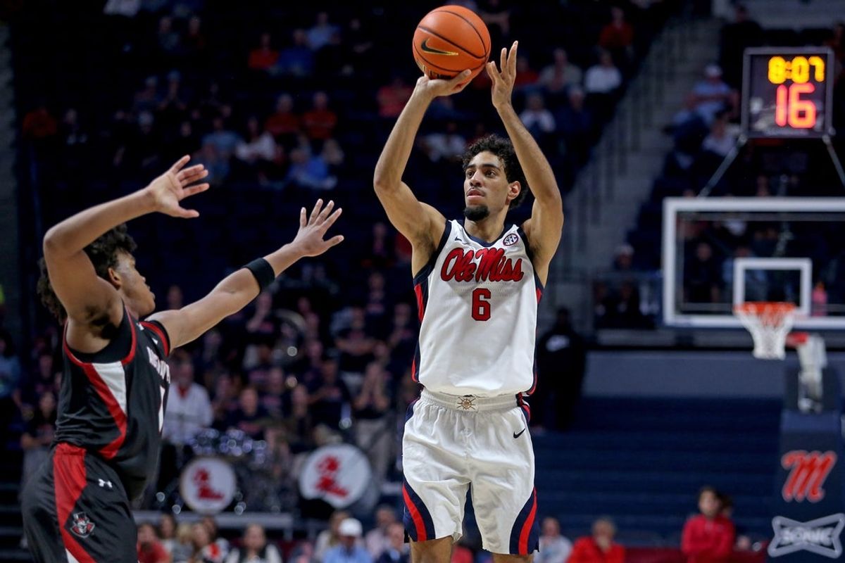 Nov 18, 2025; Oxford, Mississippi, USA; Mississippi Rebels guard Ilias Kamardine (6) shoots a three-point basket during the second half against the Austin Peay Governors at The Sandy and John Black Pavilion at Ole Miss. Mandatory Credit: Petre Thomas-Imagn Images