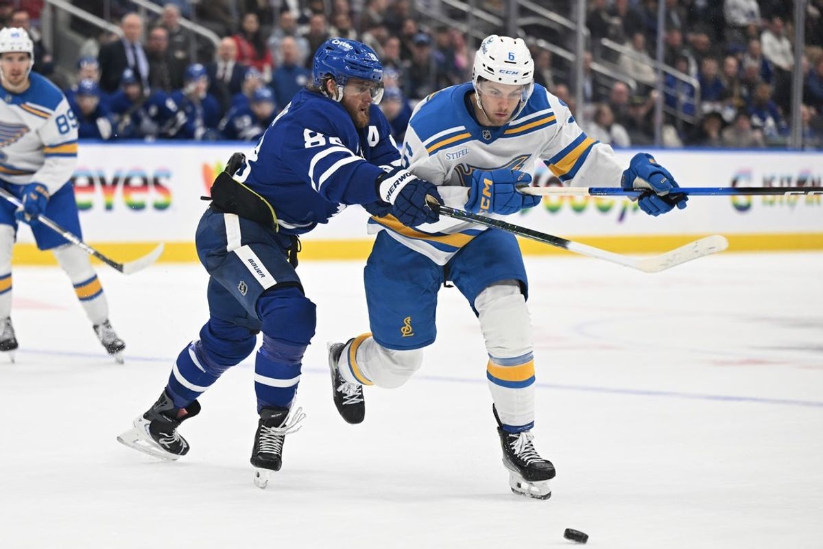 Nov 18, 2025; Toronto, Ontario, CAN;  Toronto Maple Leafs forward William Nylander (88) checks St. Louis Blues defenseman Philip Broberg (6) in overtime at Scotiabank Arena. Mandatory Credit: Dan Hamilton-Imagn Images