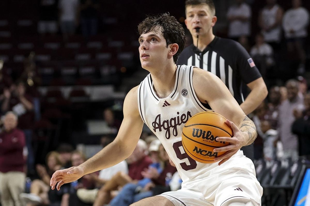 Nov 18, 2025; College Station, Texas, USA;Texas A&M Aggies guard Ruben Dominguez (9) dribbles the ball during the second half against the Montana Grizzlies at Reed Arena. Mandatory Credit: Maria Lysaker-Imagn Images