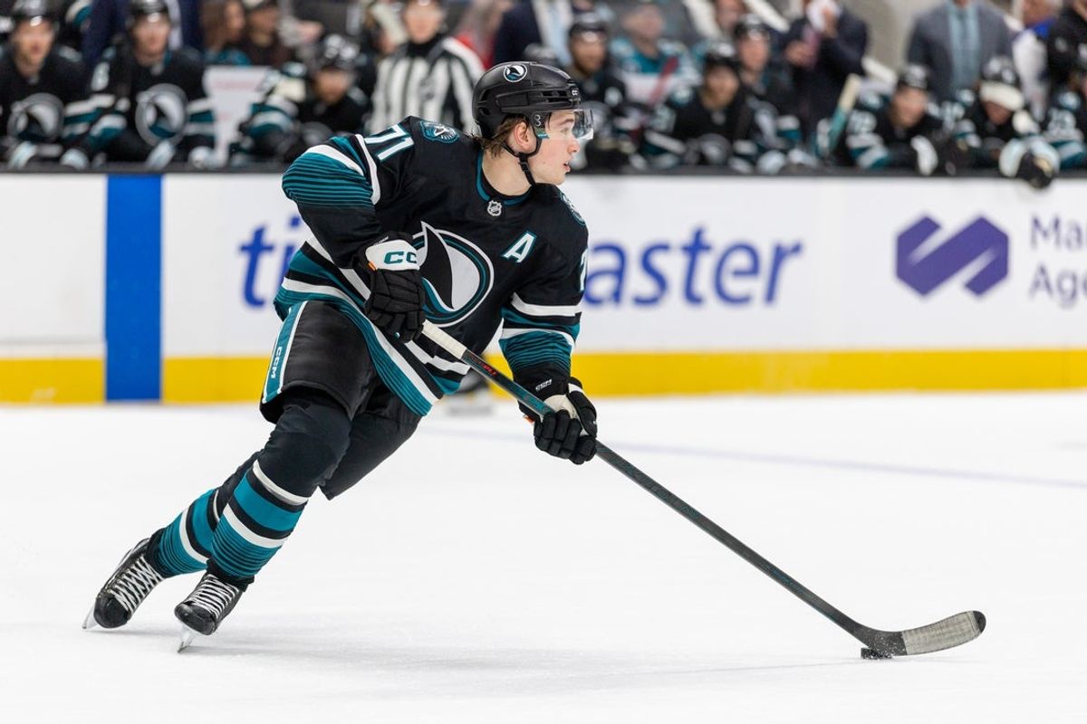 Nov 18, 2025; San Jose, California, USA; San Jose Sharks center Macklin Celebrini (71) skates with the puck during the first period against the Utah Mammoth at SAP Center at San Jose. Mandatory Credit: Bob Kupbens-Imagn Images