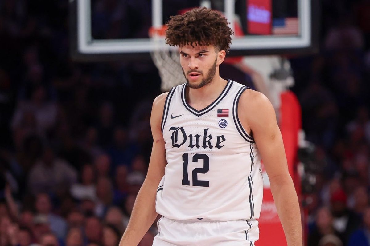 Nov 18, 2025; New York, New York, USA; Duke Blue Devils forward Cameron Boozer (12) reacts against the Kansas Jayhawks during the second half at Madison Square Garden. Mandatory Credit: Vincent Carchietta-Imagn Images