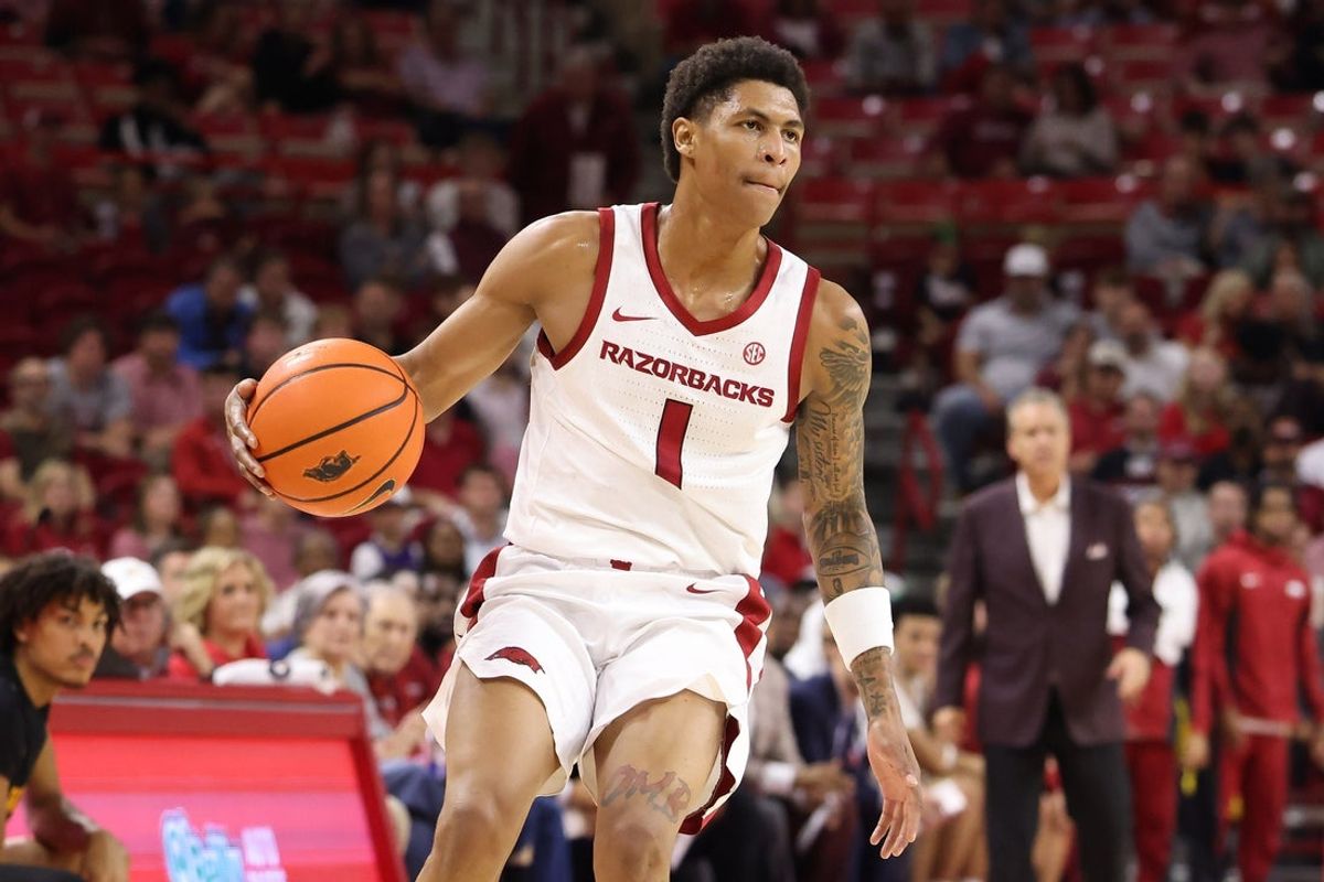 Nov 18, 2025; Fayetteville, Arkansas, USA; Arkansas Razorbacks guard Meleek Thomas (1) dribbles against the Winthrop Eagles during the first half at Bud Walton Arena. Arkansas won 84-83. Mandatory Credit: Nelson Chenault-Imagn Images