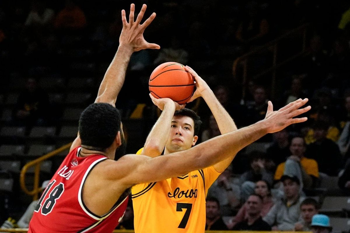 Iowa forward Alvaro Folgueiras (7) shoots the ball against Southeast Missouri center David Idada (18) Nov. 18, 2025 at Carver-Hawkeye Arena in Iowa City, Iowa.