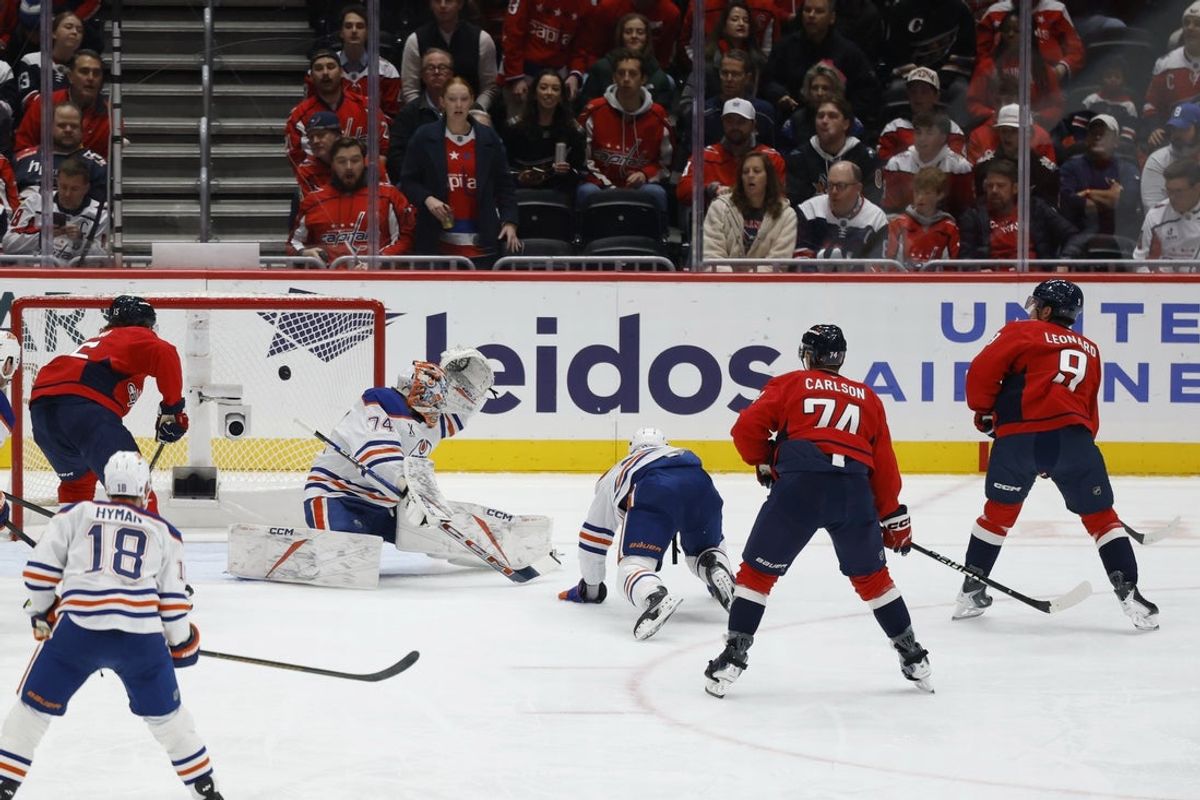 Nov 19, 2025; Washington, District of Columbia, USA; Washington Capitals right wing Ryan Leonard (9) scores a goal on Edmonton Oilers goaltender Stuart Skinner (74) during the first period at Capital One Arena. Mandatory Credit: Geoff Burke-Imagn Images