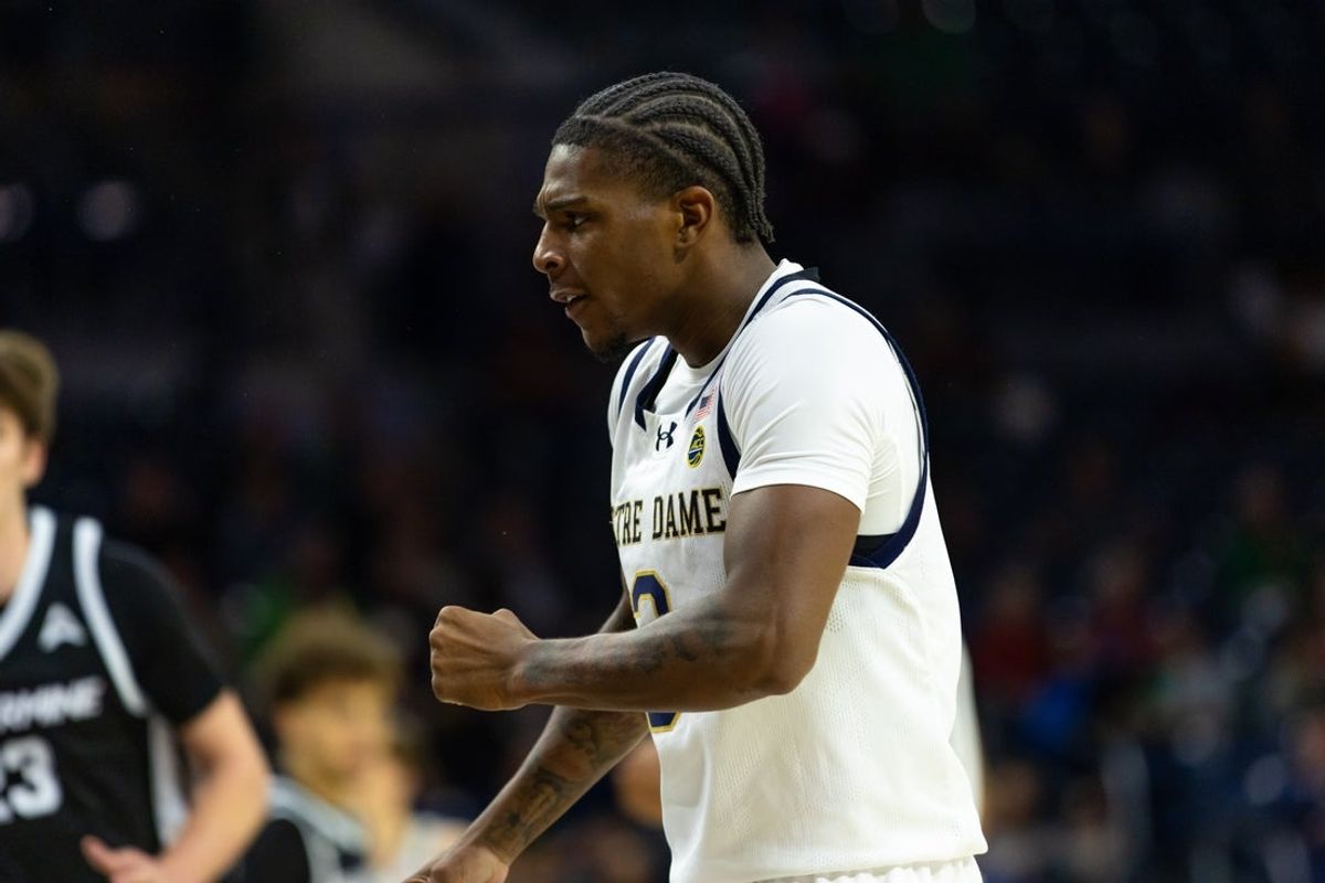 Nov 19, 2025; South Bend, Indiana, USA; Notre Dame Fighting Irish guard Markus Burton (3) reacts against the Bellarmine Knights during the first half at Purcell Pavilion at the Joyce Center. Mandatory Credit: Michael Caterina-Imagn Images