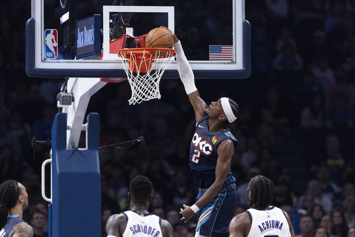 Nov 19, 2025; Oklahoma City, Oklahoma, USA; Oklahoma City Thunder guard Shai Gilgeous-Alexander (2) dunks against the Sacramento Kings during the second quarter at Paycom Center. Mandatory Credit: Alonzo Adams-Imagn Images