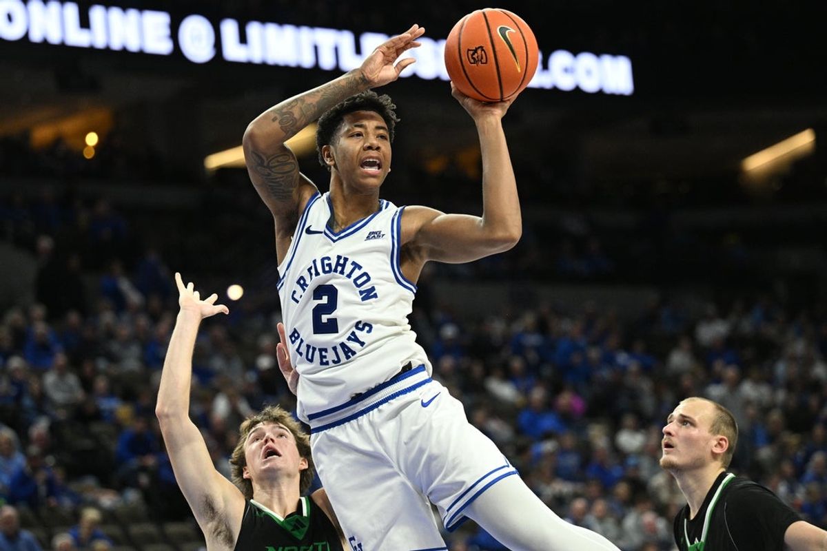 Nov 19, 2025; Omaha, Nebraska, USA;  Creighton Bluejays guard Blake Harper (2) passes against North Dakota Fighting Hawks guard Greyson Uelmen (3) during the second half at CHI Health Center Omaha. Mandatory Credit: Steven Branscombe-Imagn Images