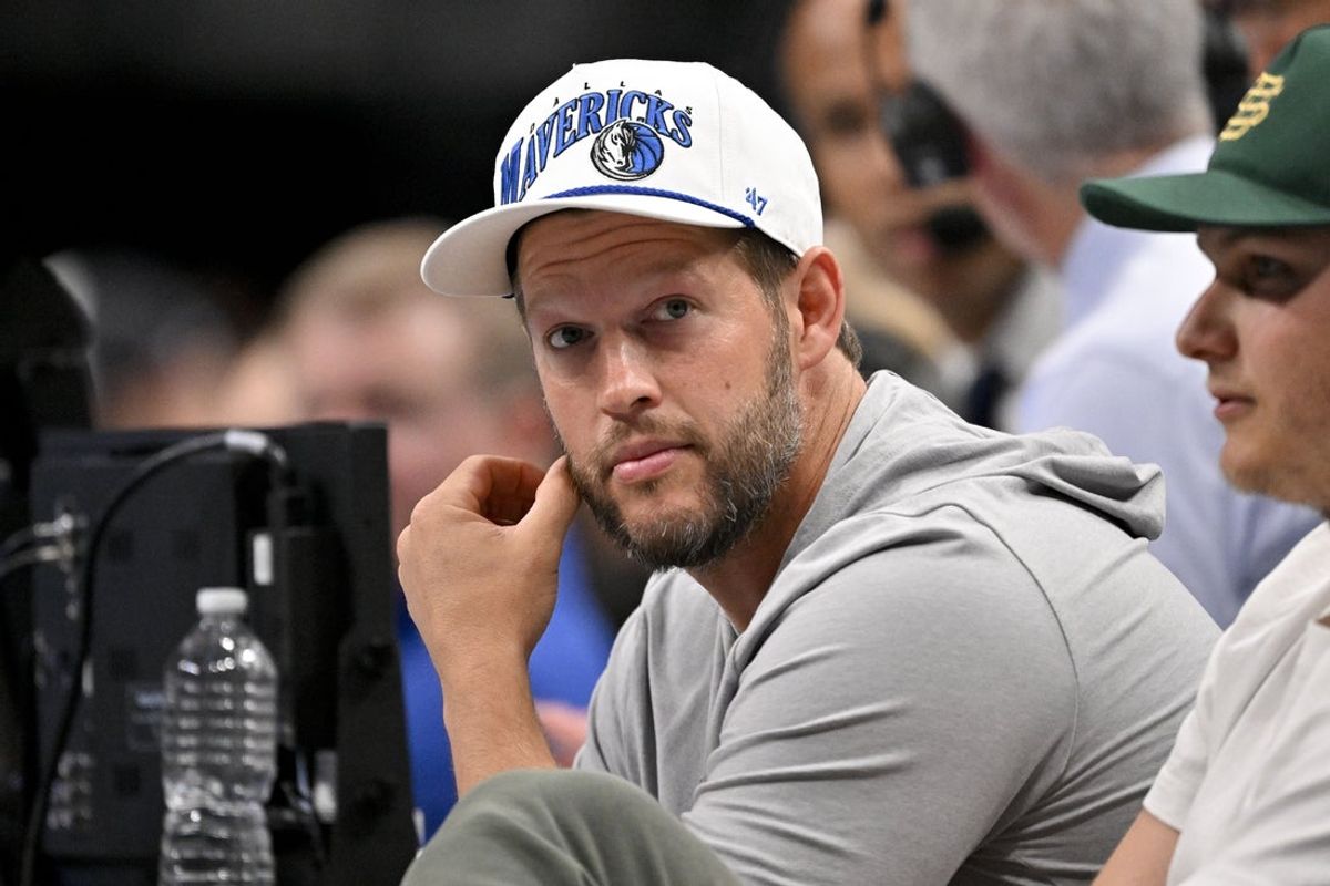 Nov 19, 2025; Dallas, Texas, USA; Los Angeles Dodgers pitcher Clayton Kershaw looks on during the second quarter between the Dallas Mavericks and the New York Knicks at the American Airlines Center. Mandatory Credit: Jerome Miron-Imagn Images