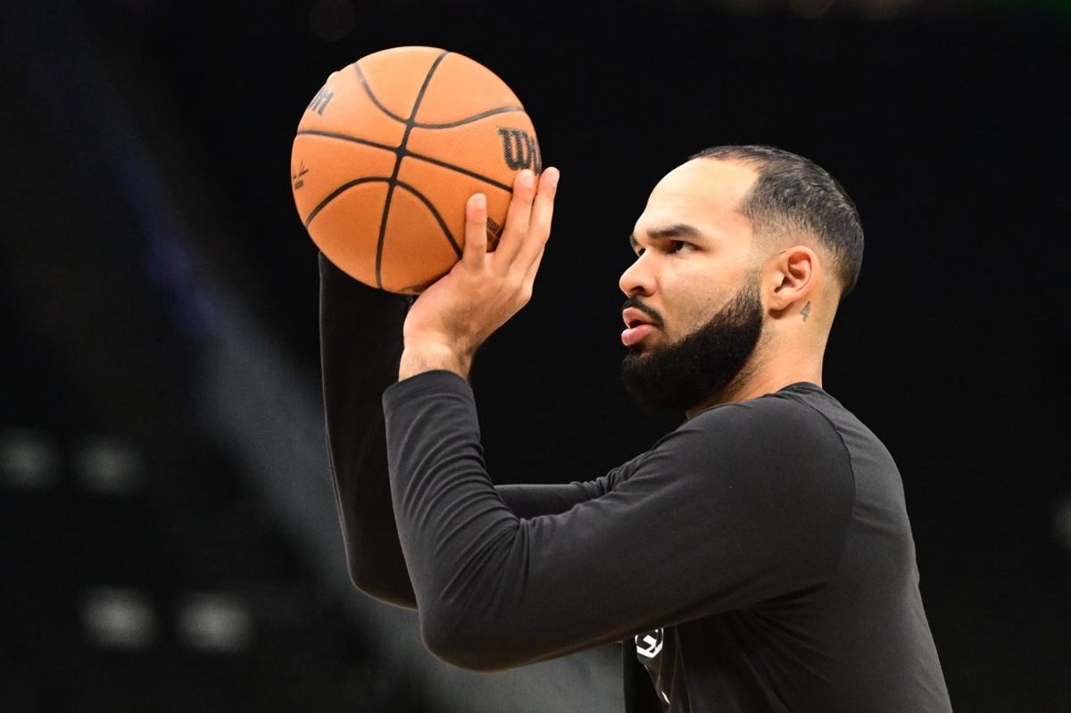 Nov 20, 2025; Milwaukee, Wisconsin, USA; Philadelphia 76ers forward Johni Broome (22) warms up before game against the Milwaukee Bucks at Fiserv Forum. Mandatory Credit: Benny Sieu-Imagn Images