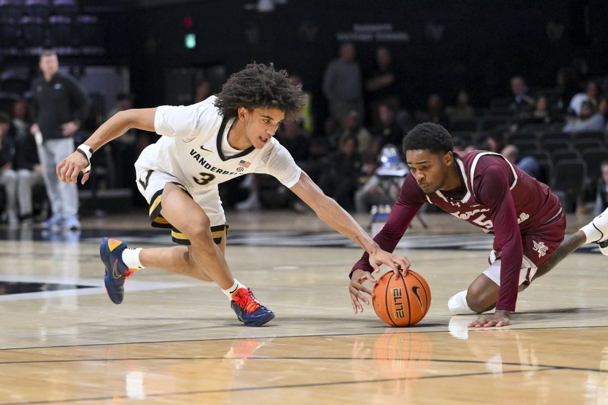 Nov 20, 2025; Nashville, Tennessee, USA;  Vanderbilt Commodores guard Tyler Tanner (3) steals the ball from Texas Southern Tigers guard Jaylen Wysinger (5) during the first half at Memorial Gymnasium. Mandatory Credit: Steve Roberts-Imagn Images