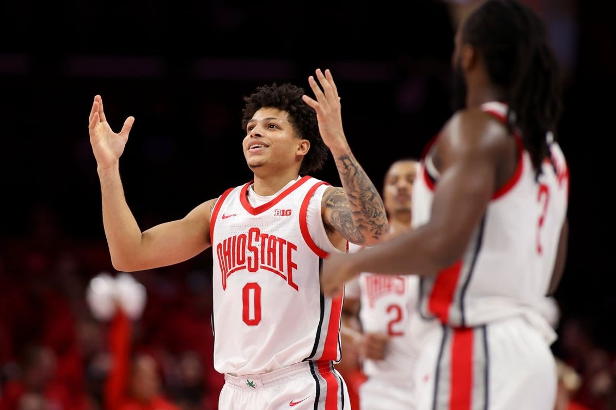 Nov 20, 2025; Columbus, Ohio, USA; Ohio State Buckeyes guard John Mobley Jr. (0) celebrates his three point basket during the first half against the Western Michigan Broncos at Value City Arena. Mandatory Credit: Joseph Maiorana-Imagn Images