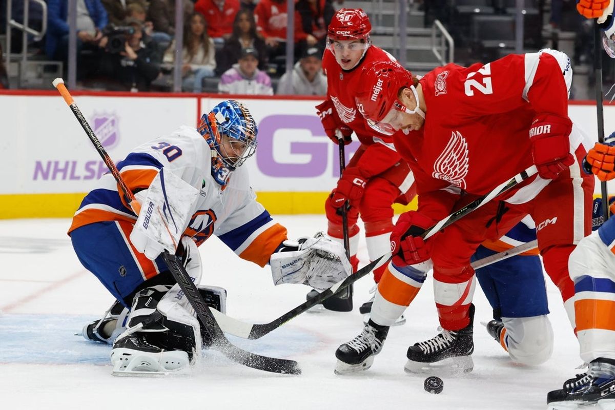 Nov 20, 2025; Detroit, Michigan, USA;  Detroit Red Wings center Mason Appleton (22) tries to score on New York Islanders goaltender Ilya Sorokin (30) in the second period at Little Caesars Arena. Mandatory Credit: Rick Osentoski-Imagn Images