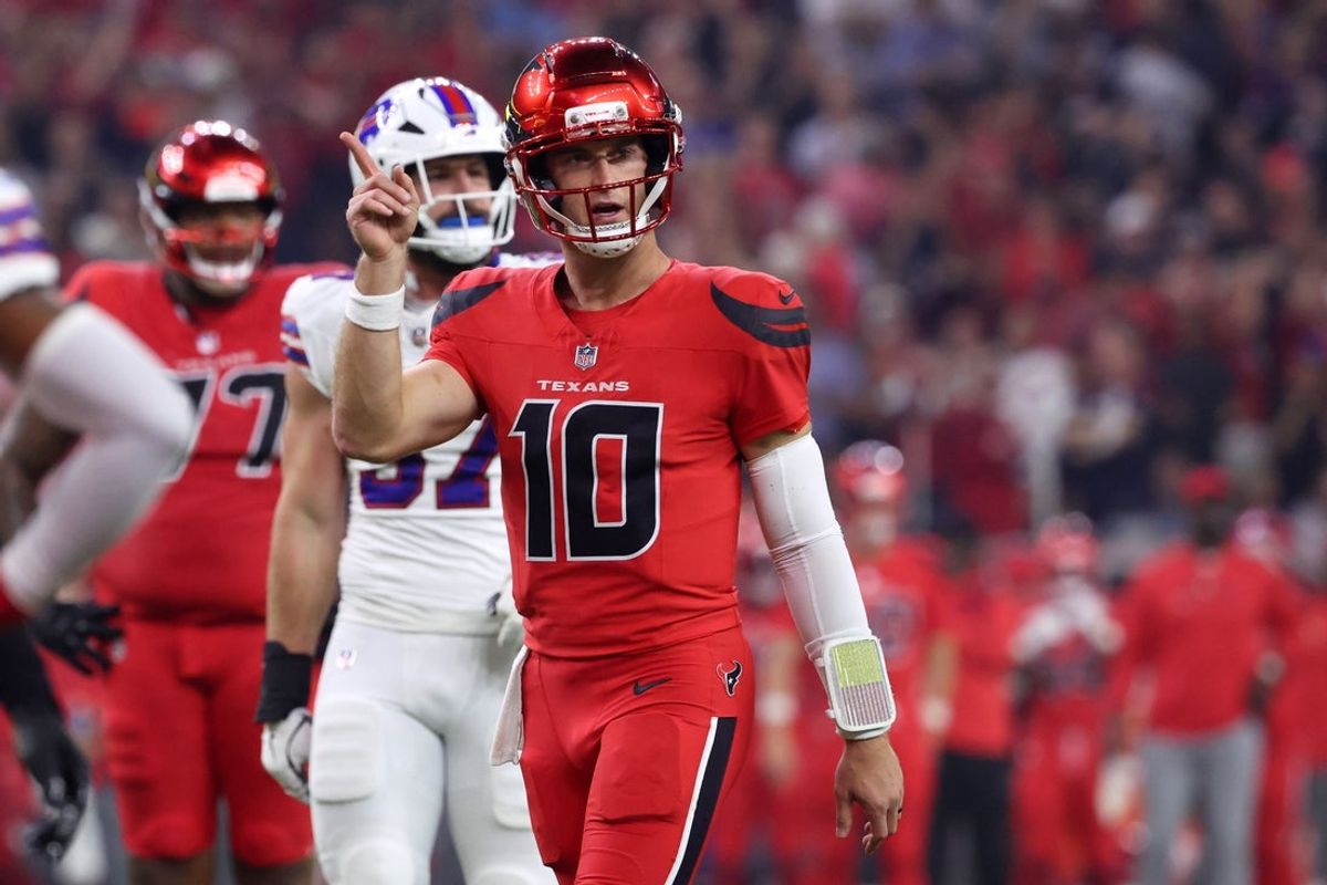 Nov 20, 2025; Houston, Texas, USA; Houston Texans quarterback Davis Mills (10) celebrates after a touchdown against the Buffalo Bills in the second quarter at NRG Stadium. Mandatory Credit: Troy Taormina-Imagn Images