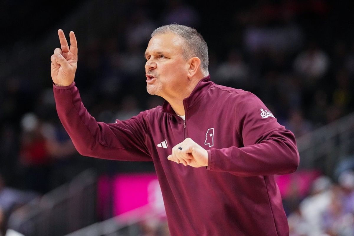 Nov 20, 2025; Kansas City, Missouri, USA; Mississippi State Bulldogs head coach Chris Jans gestures to players against the Kansas State Wildcats during the first half of the game at T-Mobile Center. Mandatory Credit: Denny Medley-Imagn Images