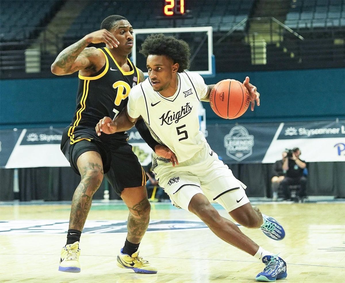 UCF’s Kris Parker (5) drives against Pittsburgh during a college basketball game Thursday, Nov. 20, 2025 at the Ocean Center.