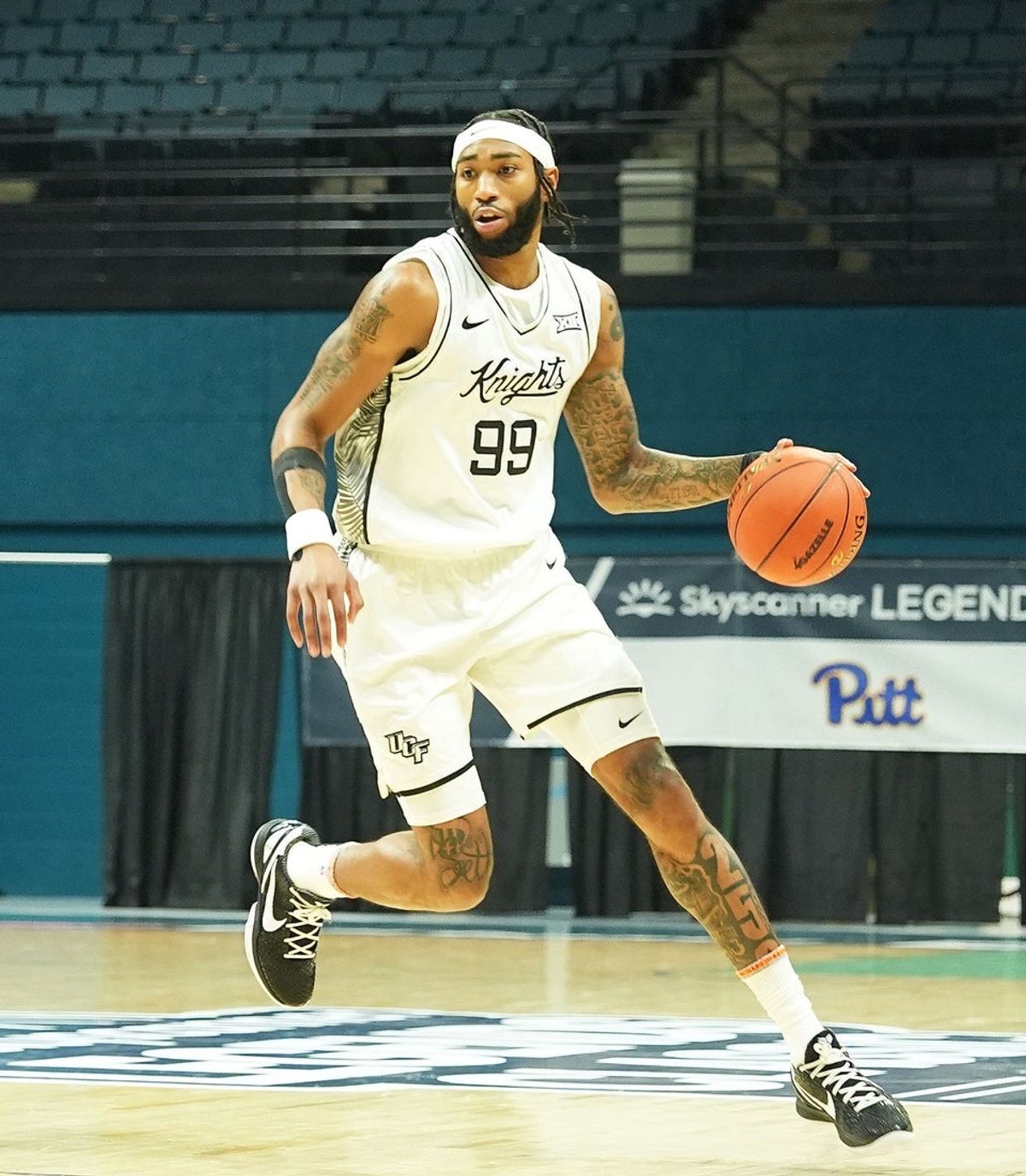 UCF’s Jordan Burks (99) dribbles the ball down the court against Pittsburgh during a college basketball game Thursday, Nov. 20, 2025 at the Ocean Center.