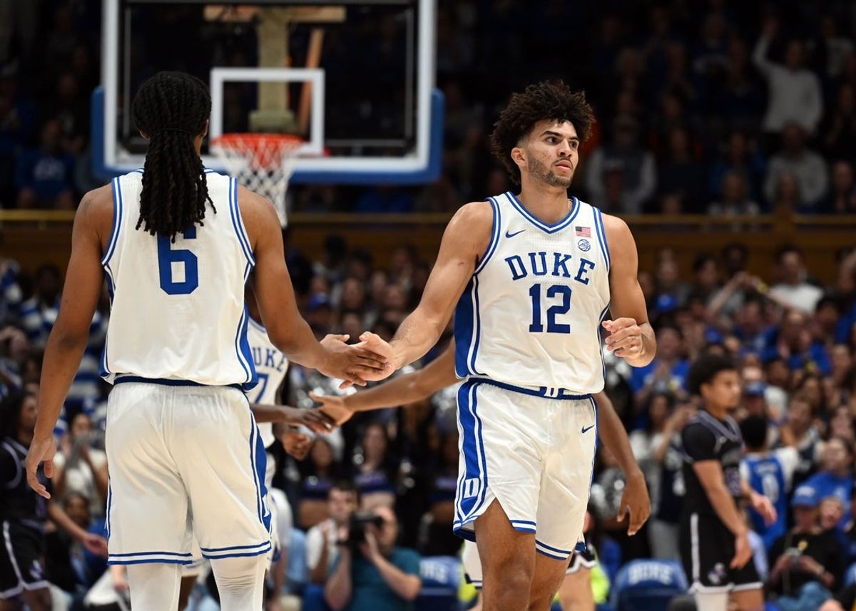Nov 21, 2025; Durham, North Carolina, USA; Duke Blue Devils forward Cameron Boozer (12) reacts as he comes off the court during a break in the first half against the Niagara Purple Eagles at Cameron Indoor Stadium. Mandatory Credit: Rob Kinnan-Imagn Images