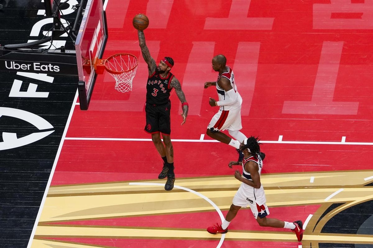 Nov 21, 2025; Toronto, Ontario, CAN; Brandon Ingram (3) of the Toronto Raptors drives to the basket against the Washington Wizards during the first half at Scotiabank Arena. Mandatory Credit: Kevin Sousa-Imagn Images