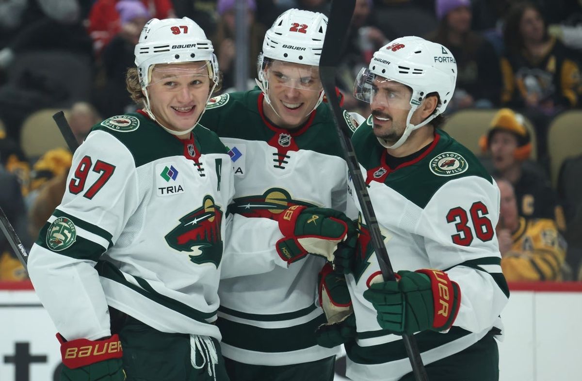 Nov 21, 2025; Pittsburgh, Pennsylvania, USA; Minnesota Wild left wing Kirill Kaprizov (97) celebrates his goal with right wing Danila Yurov (22) and center Mats Zuccarello (36) against the Pittsburgh Penguins during the second period at PPG Paints Arena. Mandatory Credit: Charles LeClaire-Imagn Images
