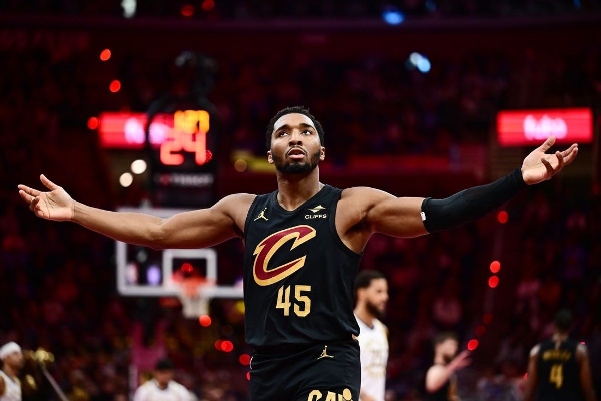 Nov 21, 2025; Cleveland, Ohio, USA; Cleveland Cavaliers guard Donovan Mitchell (45) reacts after a basket against the Indiana Pacers during the second half at Rocket Arena. Mandatory Credit: Ken Blaze-Imagn Images