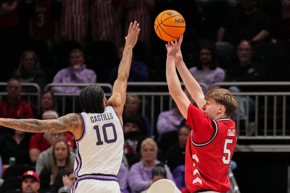 Nov 21, 2025; Kansas City, MO, USA; Nebraska Cornhuskers forward Braden Frager (5) shoots over Kansas State Wildcats guard David Castillo (10) during the first half of the game at T-Mobile Center. Mandatory Credit: Denny Medley-Imagn Images