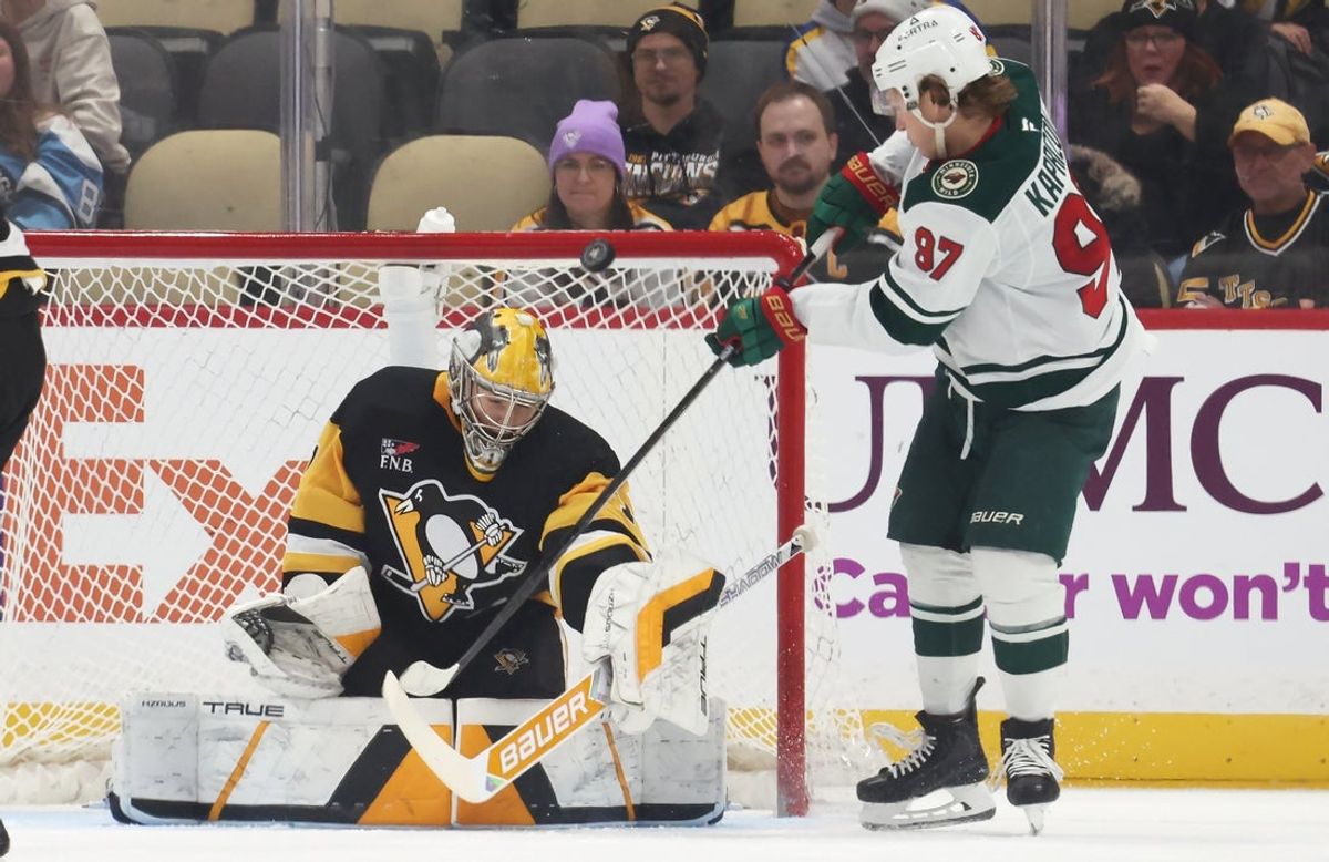 Nov 21, 2025; Pittsburgh, Pennsylvania, USA;  Pittsburgh Penguins goaltender Sergei Murashov (1) makes a save against Minnesota Wild left wing Kirill Kaprizov (97) during the third period at PPG Paints Arena. Mandatory Credit: Charles LeClaire-Imagn Images