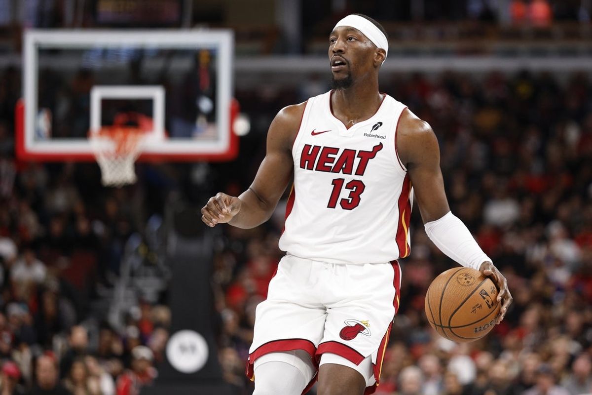Nov 21, 2025; Chicago, Illinois, USA; Miami Heat center Bam Adebayo (13) brings the ball up court against the Chicago Bulls during the second half at United Center. Mandatory Credit: Kamil Krzaczynski-Imagn Images