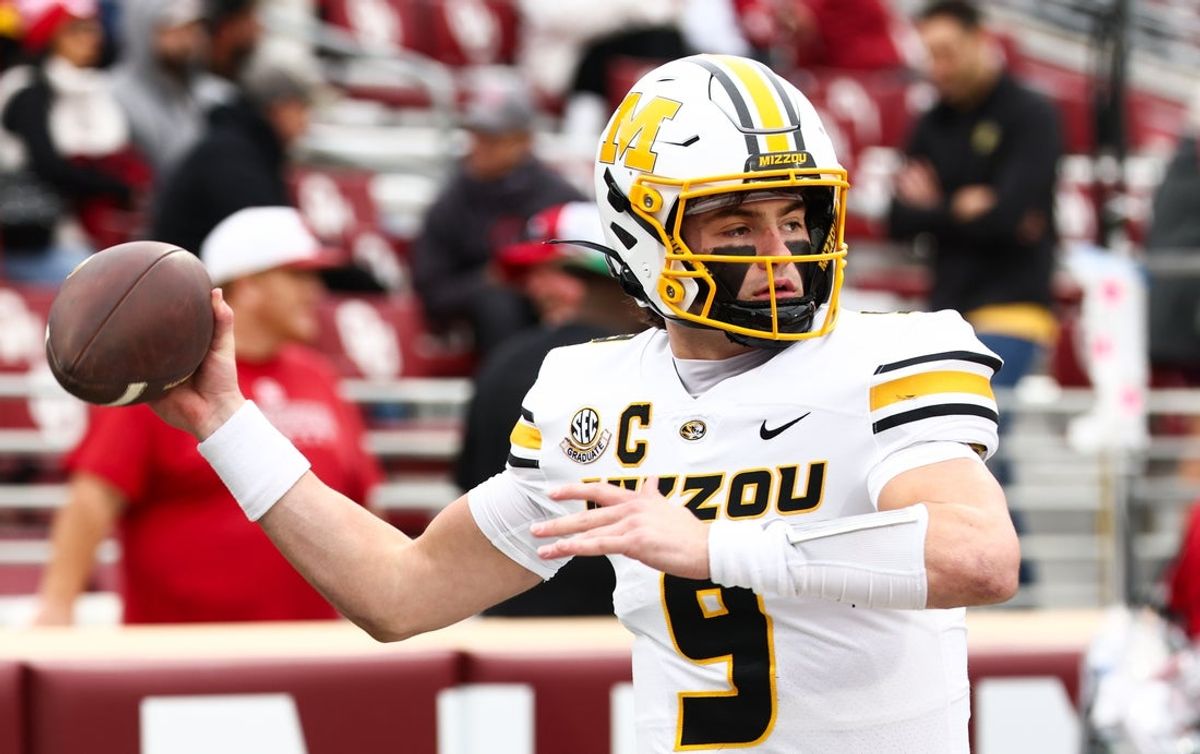 Nov 22, 2025; Norman, Oklahoma, USA;  Missouri Tigers quarterback Beau Pribula (9) warms up before the game against the Oklahoma Sooners at Gaylord Family-Oklahoma Memorial Stadium. Mandatory Credit: Kevin Jairaj-Imagn Images