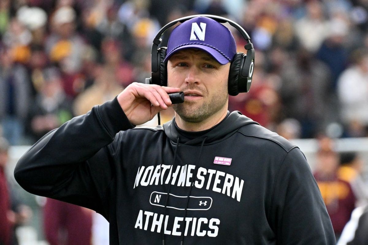 Nov 22, 2025; Chicago, Illinois, USA; Northwestern Wildcats head coach David Braun is seen against the Minnesota Golden Gophers during the first half at Wrigley Field. Mandatory Credit: Patrick Gorski-Imagn Images