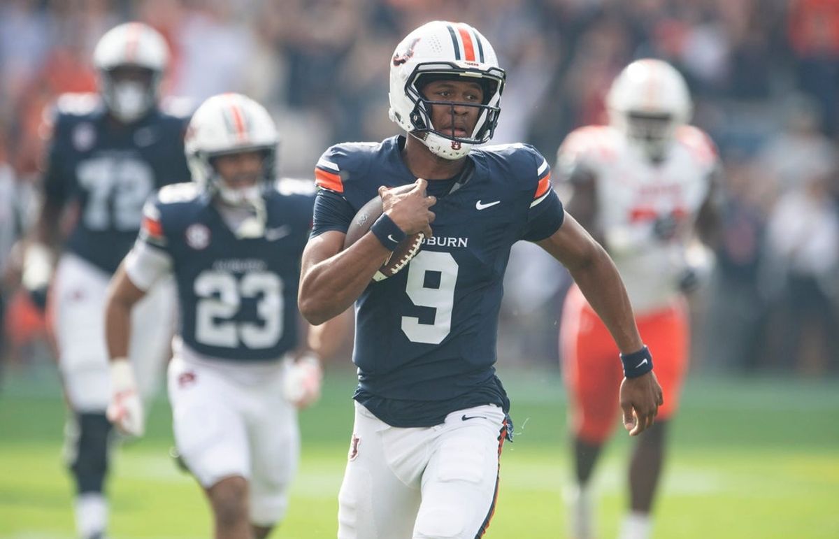 Auburn Tigers quarterback Deuce Knight (9) breaks free for a touchdown run on the first play of the game as Auburn Tigers take on Mercer Bears at Jordan-Hare Stadium in Auburn, Ala. on Saturday, Nov. 22, 2025.