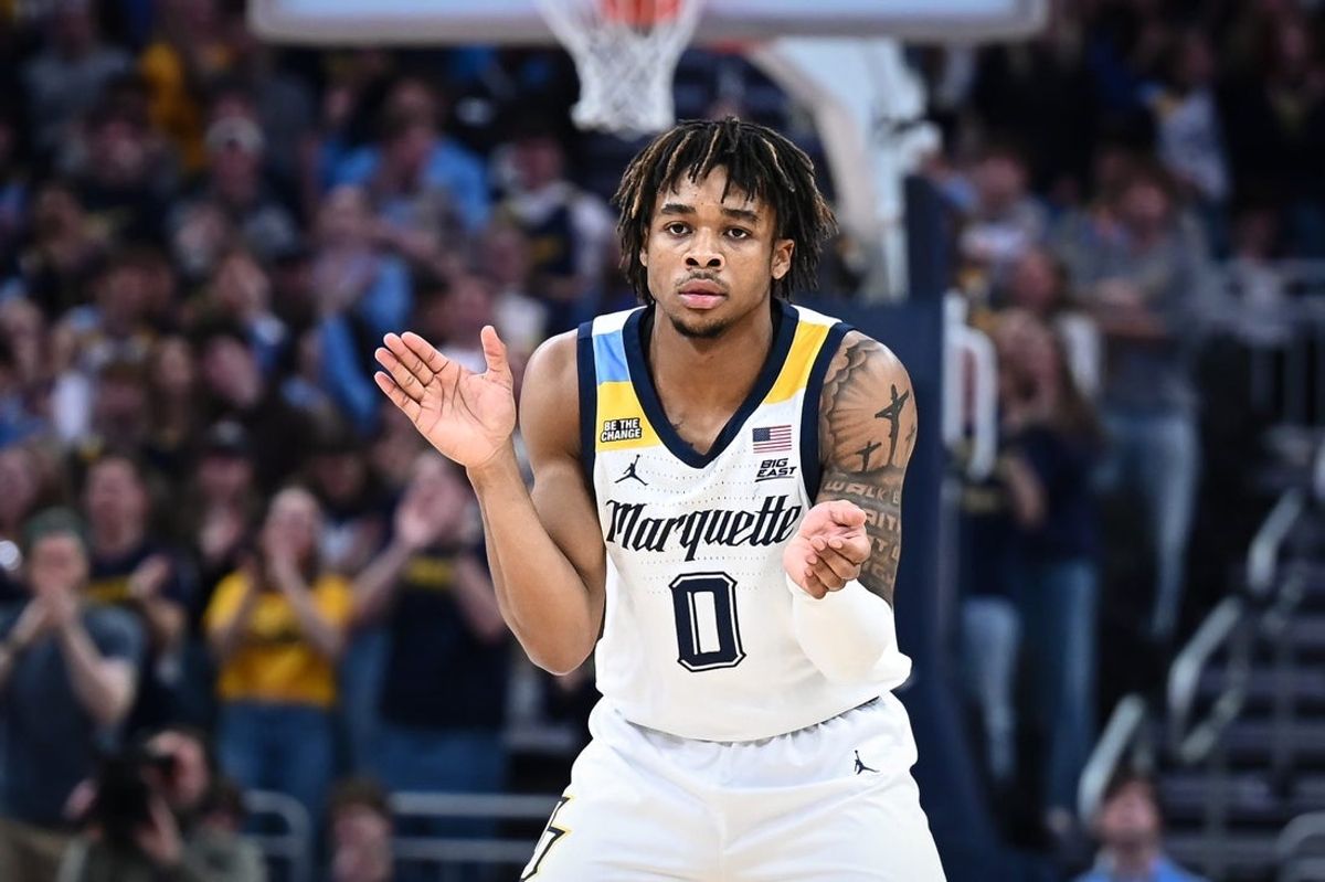 Marquette guard Nigel James Jr. (0) celebrates his 3-point shot against Central Michigan in the first half of a game Saturday, November 22, 2025, at Fiserv Forum in Milwaukee, Wisconsin.